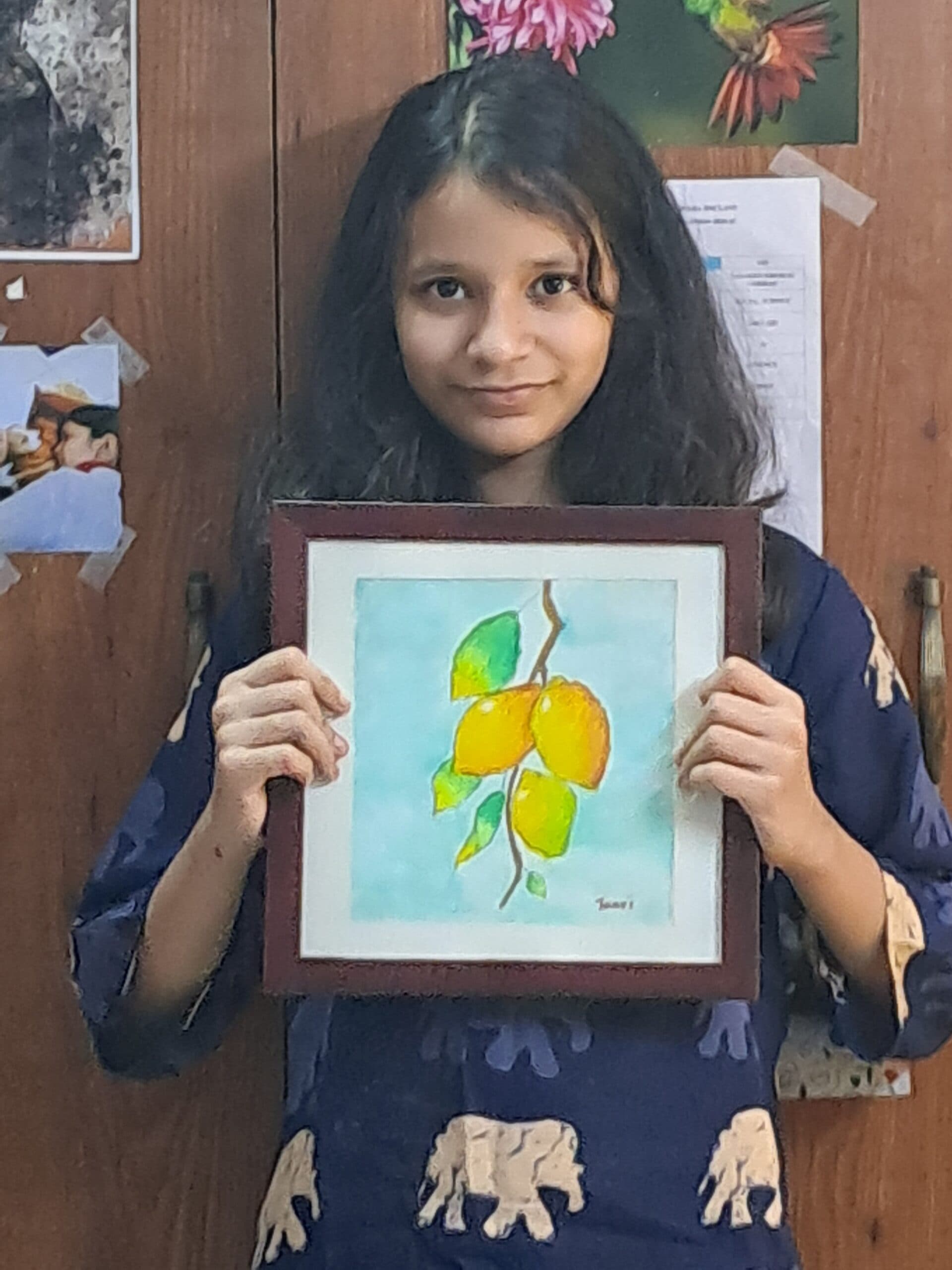 Older student with artwork